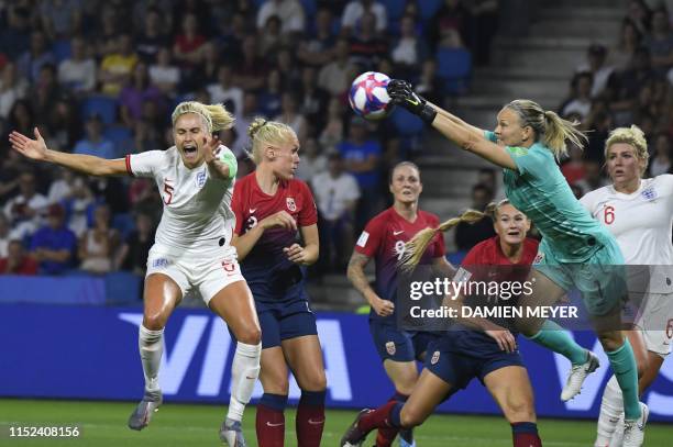 Norway's goalkeeper Ingrid Hjelmseth makes a save in front of England's defender Steph Houghton during the France 2019 Women's World Cup...