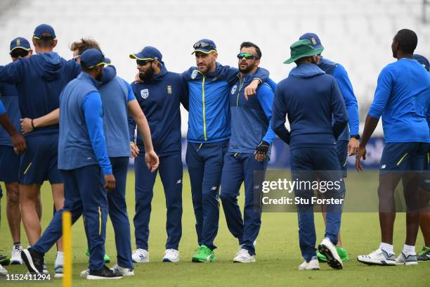 South Africa captain Faf du Plessis and team mates huddle during nets ahead of their opening ICC Crricket World Cup match against England at The Oval...