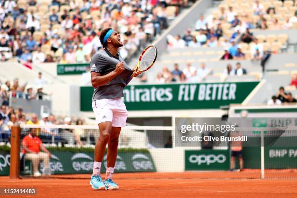 Jo Wilfred Tsonga of France celebrates during his mens singles second round match against Kei Nishikori of Japan during Day four of the 2019 French...