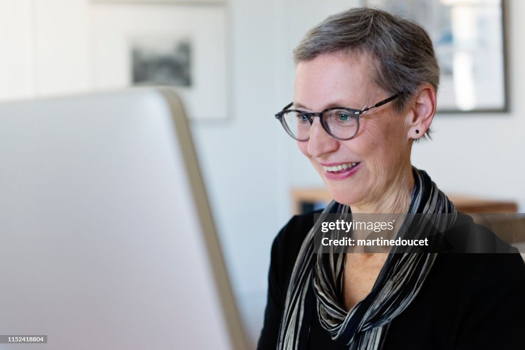 60+ home working professional architect and historian woman