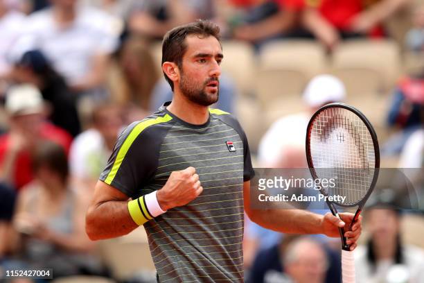 Marin Cilic of Croatia celebrates during his mens singles second round match against Grigor Dimitrov of Bulgaria during Day four of the 2019 French...