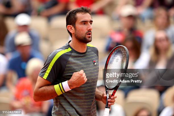 Marin Cilic of Croatia celebrates during his mens singles second round match against Grigor Dimitrov of Bulgaria during Day four of the 2019 French...