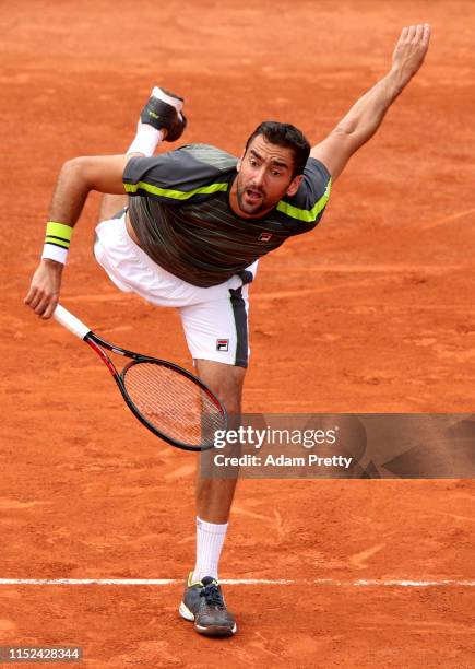 Marin Cilic of Croatia serves during his mens singles second round match against Grigor Dimitrov of Bulgaria during Day four of the 2019 French Open...