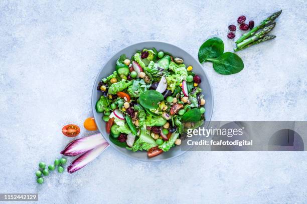 vegan food: healthy fresh vegetables salad shot from above - chick pea salad stock pictures, royalty-free photos & images