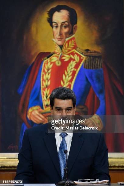 Nicolas Maduro President of Venezuela gestures during the Simon Bolivar Journalism National Award ceremony at Palacio de Miraflores on June 27, 2019...