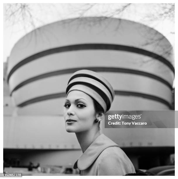 Model Isabella Albonico wearing a hat reminding the Guggenheim Museum in New York City.
