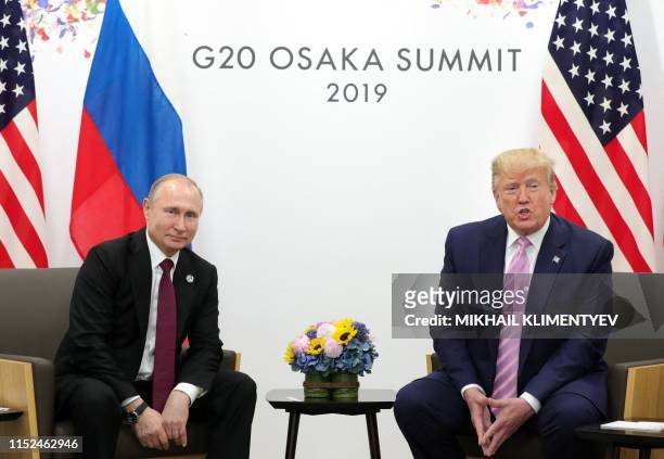 Russian President Vladimir Putin and US President Donald Trump hold a meeting on the sidelines of the G20 summit in Osaka on June 28, 2019.