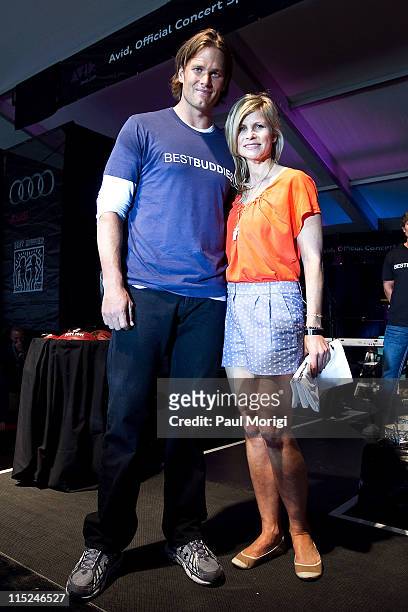 Tom Brady and Anja Kaehny, Manager Lifestyle Communications/CSR at Audi of America LLC, pose for a photo at the 2011 Audi Best Buddies Challenge...