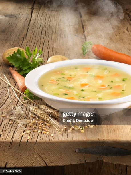 chicken soup with cream and vegetables - noodle soup stock pictures, royalty-free photos & images