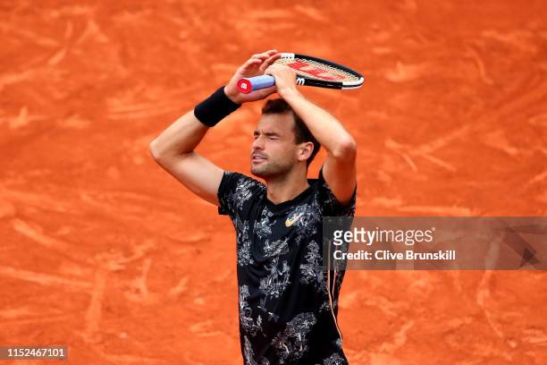 Grigor Dimitrov of Bulgaria celebrates victory during his mens singles second round match against Marin Cilic of Croatia during Day four of the 2019...
