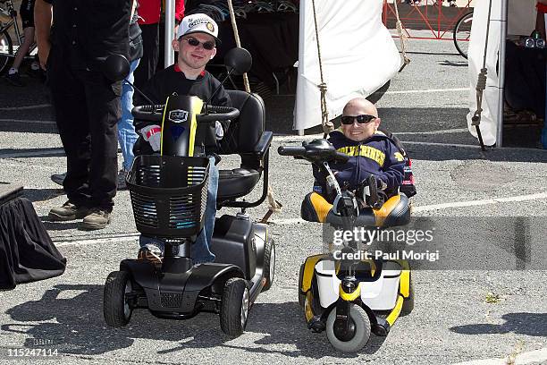 Best Buddy Alex O'Brien and Verne Troyer pose for a photo at the 2011 Audi Best Buddies Challenge on June 4, 2011 in Hyannis, Massachusetts.