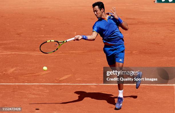 Hugo Dellien of Bolivia returns a shot in his mens singles second round match against Stefanos Tsitsipas of Greece during Day four of the 2019 French...