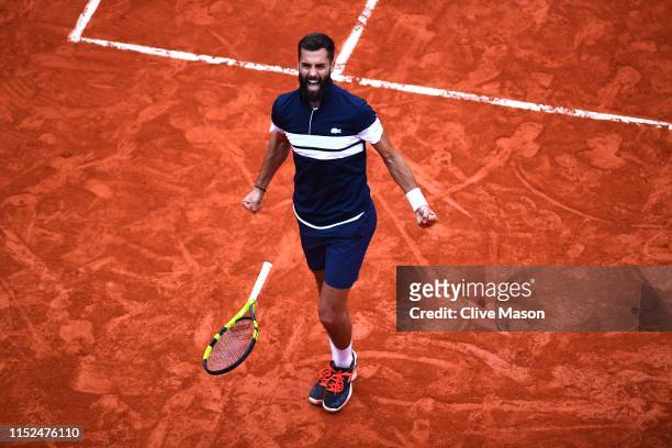 Benoit Paire of France celebrates victory during his mens singles second round match against Pierre-Hugues Herbert of France during Day four of the...