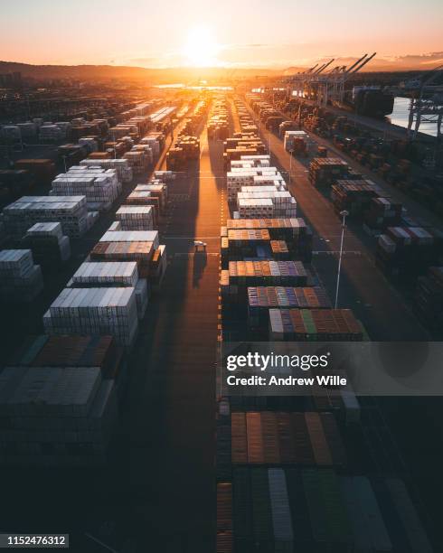 oakland shipping yard sunrise - shipyard aerial stock pictures, royalty-free photos & images