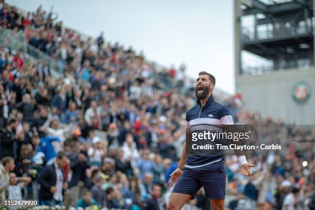 May 29. Benoit Paire of France celebrates his victory over fellow countryman Pierre-Hugues Herbert of France winning11-9 in the fifth set during the...