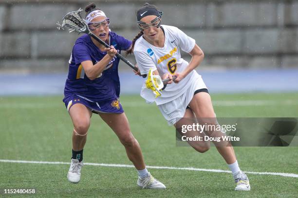 Brenna Lynch of the West Chester Golden Rams chases Chelsea Abreu of the Adelphi Panthers during the 2019 Division II Women's Lacrosse Championship...