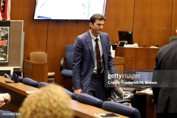 Ashton Kutcher leaves the witness stand after testifying during the trial of alleged serial killer Michael Gargiulo, known as the “Hollywood Ripper,”...