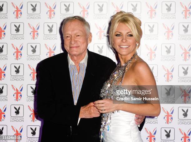 Hugh Hefner and Crystal Harris pose at the Playboy Club Launch Party at the Playboy Club on June 4, 2011 in London, England.
