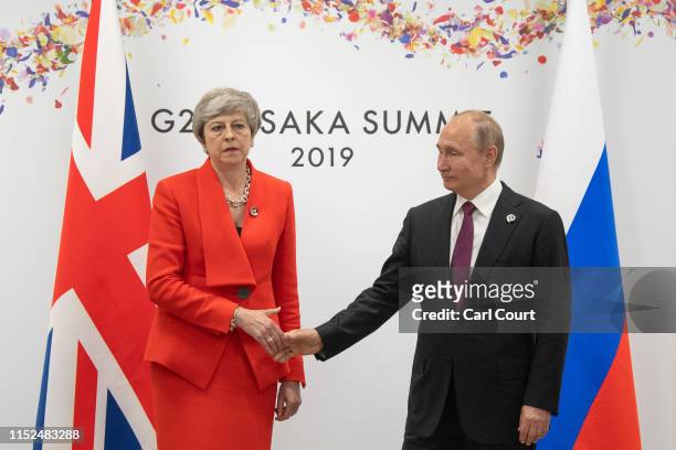 Britain's Prime Minister, Theresa May, meets Russia's President, Vladimir Putin, during a bilateral meeting on the first day of the G20 summit on...