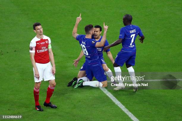 Olivier Giroud of Chelsea celebrates after scoring his team's first goal with Pedro and N'Golo Kante of Chelsea as Laurent Koscielny of Arsenal...