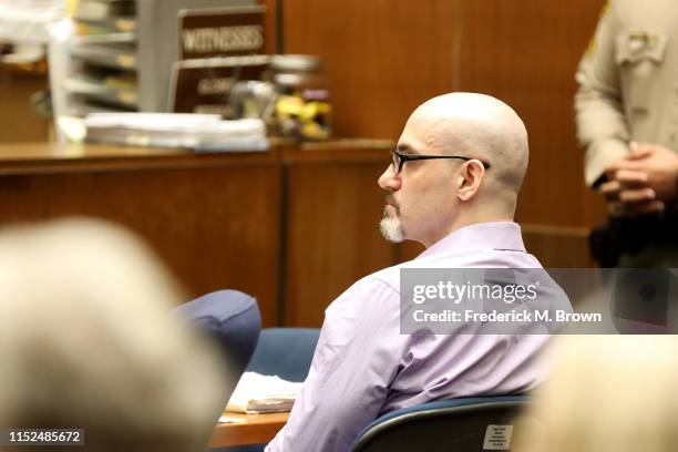 Alleged serial killer Michael Gargiulo, known as the “Hollywood Ripper,” listens as Ashton Kutcher testifies during Gargiulo’s trial of at the Clara...