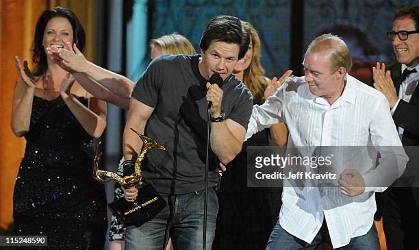 Boxer Dicky Eklund punches Mark Wahlberg onstage during Spike TV's 5th annual 2011 "Guys Choice" Awards at Sony Pictures Studios on June 4, 2011 in...