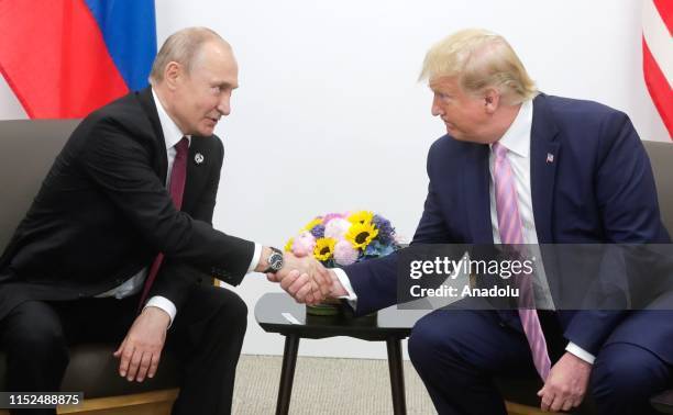 President Donald Trump meets Russian President Vladimir Putin on the first day of the G20 summit in Osaka, Japan on June 28, 2019.