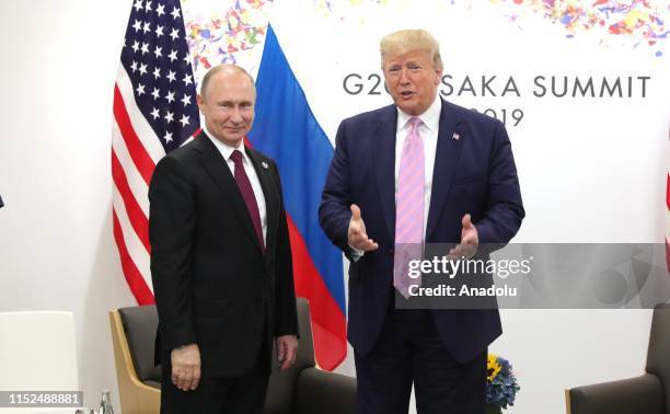 President Donald Trump meets Russian President Vladimir Putin on the first day of the G20 summit in Osaka, Japan on June 28, 2019.