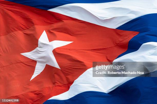 extreme close up of the cuban flag waving - cuba fotografías e imágenes de stock