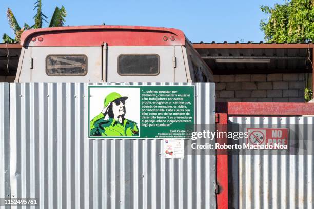 santa clara, cuba, image of raul castro on a small private busines - small busines stock pictures, royalty-free photos & images