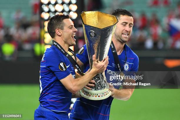 Cesar Azpilicueta of Chelsea and Gary Cahill of Chelsea celebrate with the Europa League Trophy following their victory in the UEFA Europa League...