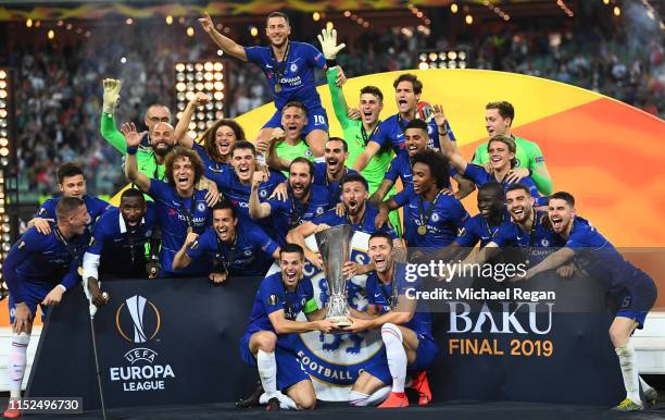 Cesar Azpilicueta of Chelsea and Gary Cahill of Chelsea celebrates with the Europa League Trophy following there team's victory in the UEFA Europa...