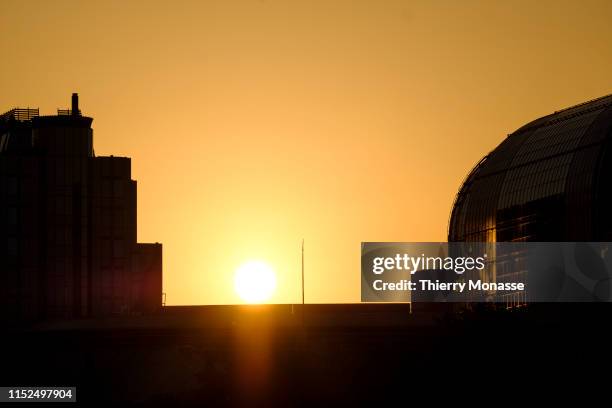 Sun is going down behind the European Parliament building on June 26, 2019 in Brussels, Belgium. The Paul-Henri Spaak building is the complex of...