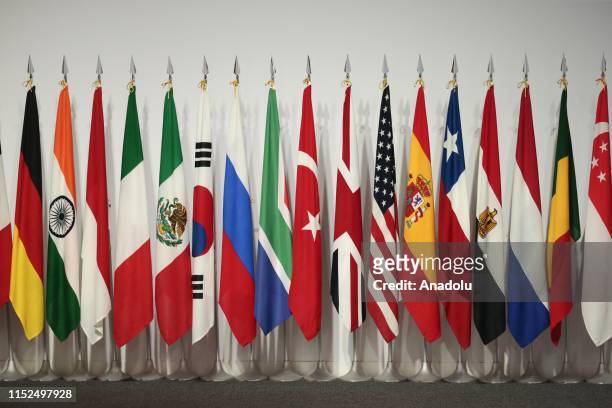 Flags of participant countries are displayed on the first day of the G20 summit in Osaka, Japan on June 28, 2019.