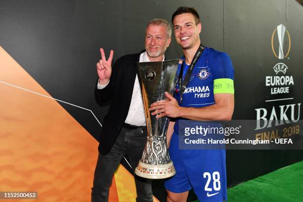 Chelsea owner Roman Abramovich and Cesar Azpilicueta of Chelsea celebrates with the Europa League Trophy following their team's victory in the UEFA...