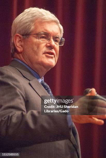 Low-angle close-up of politician Newt Gingrich, speaking during a Milton S Eisenhower Symposium, Homewood Campus of Johns Hopkins University,...