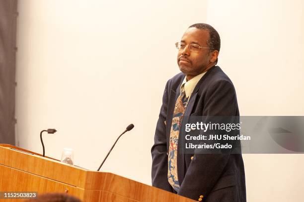 Three-quarter profile view of keynote speaker Ben Carson standing at a podium during the Minority Pre-Health Conference at the Johns Hopkins...