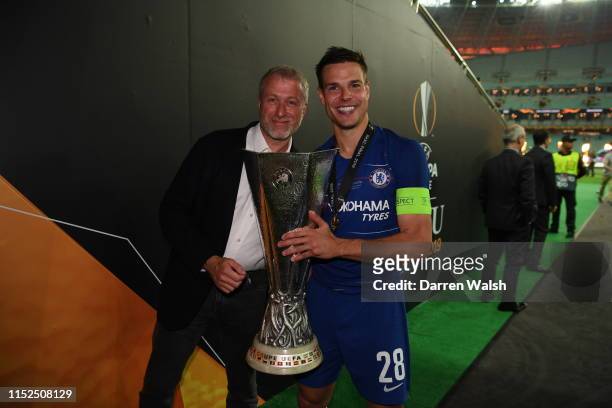 Chelsea owner Roman Abramovich and Cesar Azpilicueta of Chelsea celebrate with the Europa League Trophy following their team's victory in the UEFA...