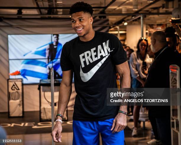 Milwaukee Bucks forward and NBA's Most Valuable Player for the 2018-2019 season Giannis Antetokounmpo leaves a Nike store after attending a...