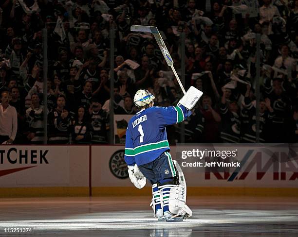 Roberto Luongo of the Vancouver Canucks waves to the fans after the Canucks won in overtime in Game Two of the 2011 NHL Stanley Cup Finals at Rogers...