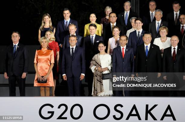 Brazilian President Jair Bolsonaro, French President's wife Brigitte Macron and French President Emmanuel Macron, Indonesia President Joko Widodo and...