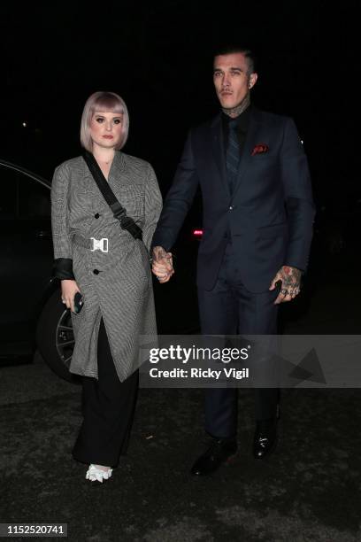 Kelly Osbourne and Jimmy Q seen attending A Magazine Curated By - issue launch party at Two Temple Place on May 29, 2019 in London, England.