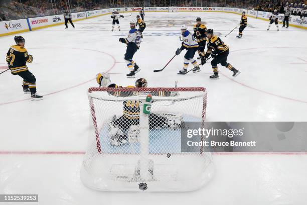 Tuukka Rask of the Boston Bruins allows the game-winning goal to Carl Gunnarsson of the St. Louis Blues during the first overtime period to give the...