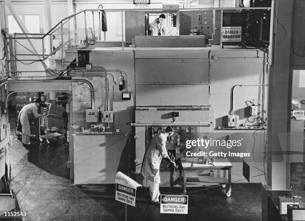 View of inside Los Alamos National Laboratory as researchers work on a nuclear testing project in 1974. The FBI believes China had miniaturized its...