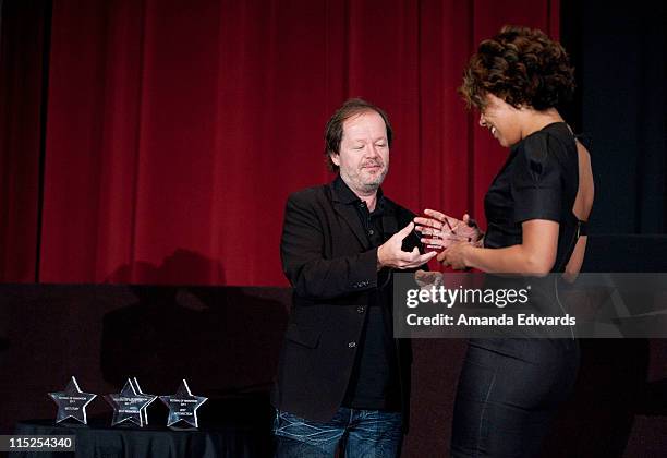 Animation director Chuck Sheetz presents an award to Vivian Lee at the UCLA Animation Workshop Festival of Animation at the James Bridges Theater at...