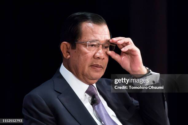 Cambodia's Prime Minister Hun Sen adjusts his glasses during the 25th International Conference on The Future of Asia on May 30, 2019 in Tokyo, Japan....