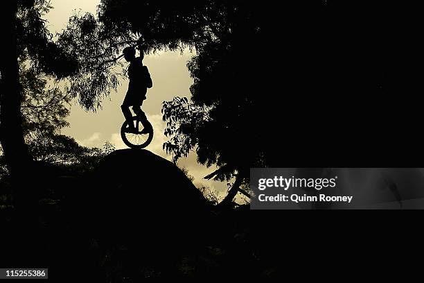 Peter Bell muicycles at Lysterfield Park on June 4, 2011 in Melbourne, Australia. Municycling is an emerging adventure sport that consists of...