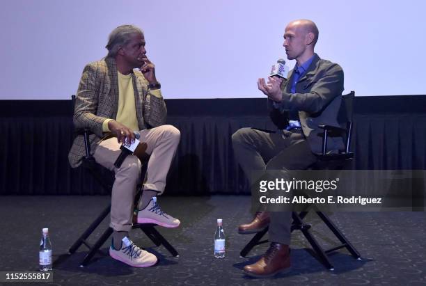 Elvis Mitchell and Richard Rowley attend Film Independent Presents: "16 Shots" special screening and Q&A at ArcLight Hollywood on May 29, 2019 in...