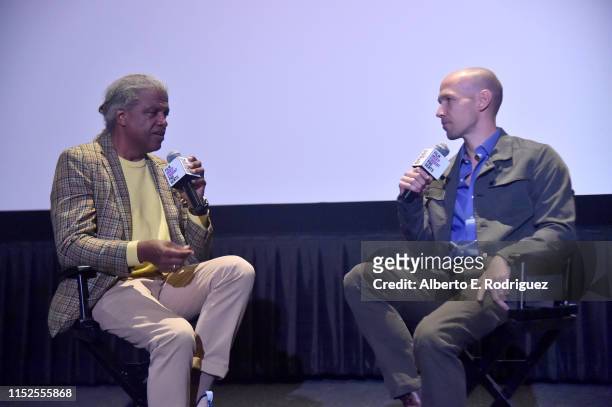 Elvis Mitchell and Richard Rowley attend Film Independent Presents: "16 Shots" special screening and Q&A at ArcLight Hollywood on May 29, 2019 in...