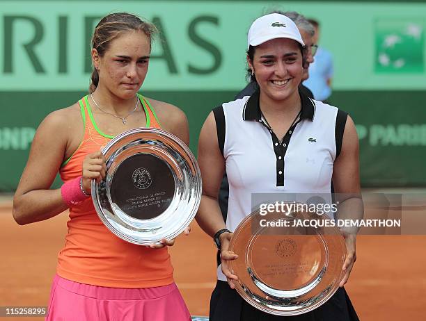 Tunisia's Ons Jabeur celebrates after winning over Peurto Rico's Monica Puig during their Girls's Singles final match in the French Open tennis...